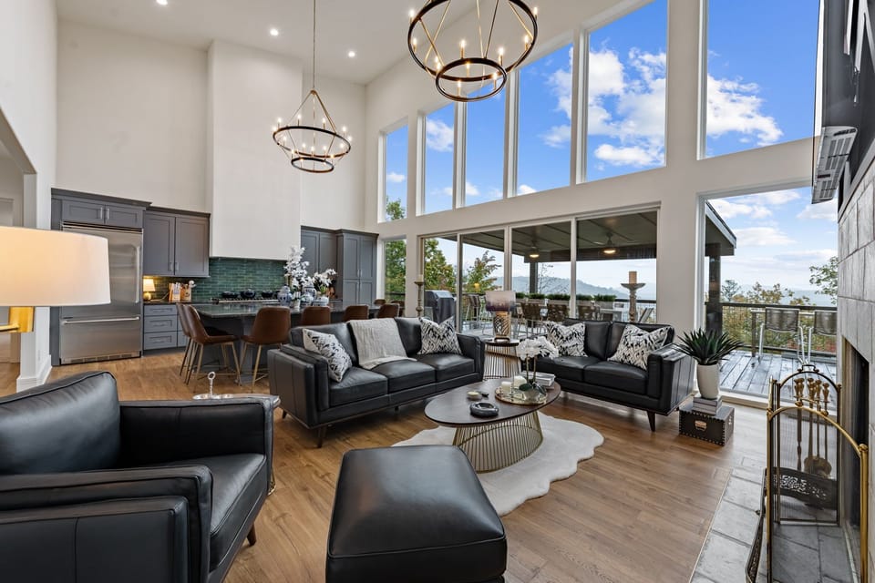 Seamless indoor-outdoor flow lets you move effortlessly from fireside comfort to open-air mountain views.