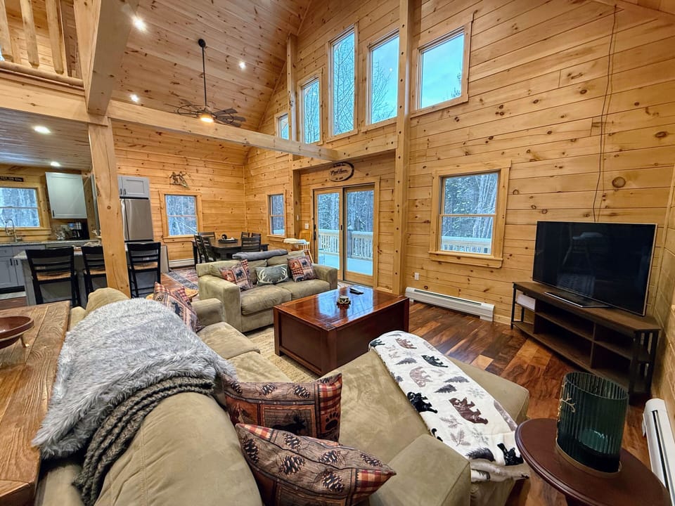 Open living kitchen and dining areas.