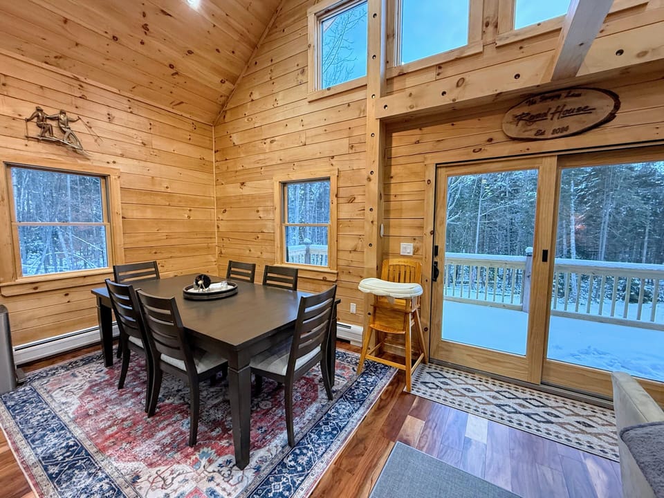 Open living kitchen and dining areas.
