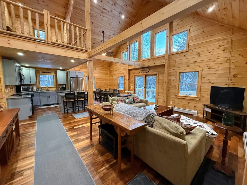 Open living kitchen and dining areas.