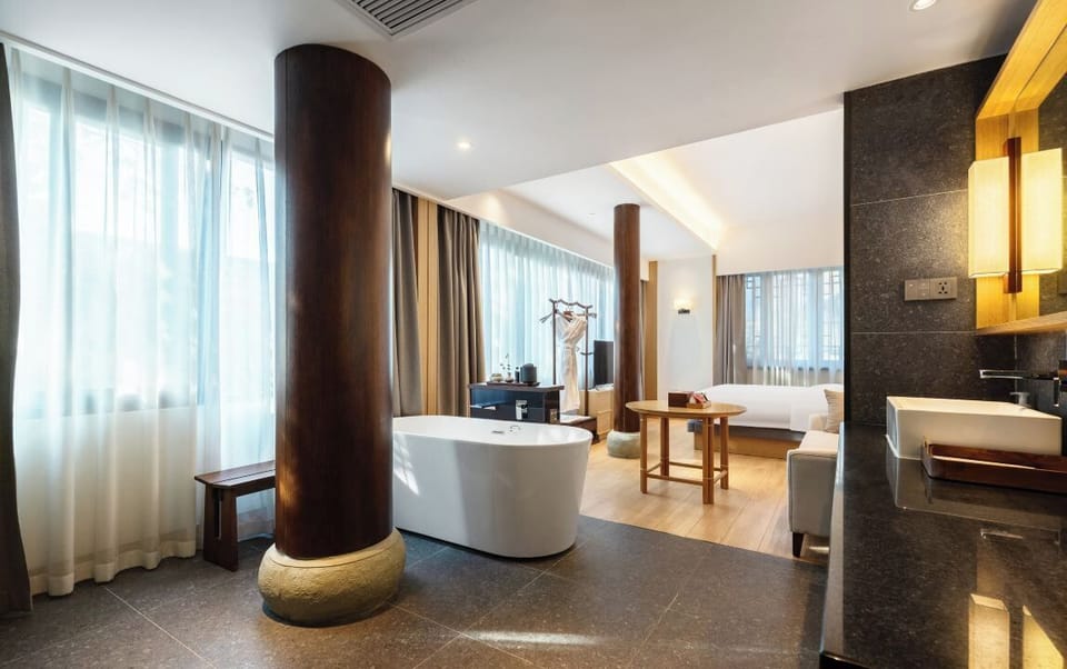 Signature Double Room, City View | Living room | 55-inch LCD TV with cable channels