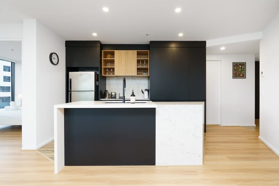 Cook, entertain, or simply enjoy a quiet meal in a beautifully crafted kitchen featuring an elegant extended island