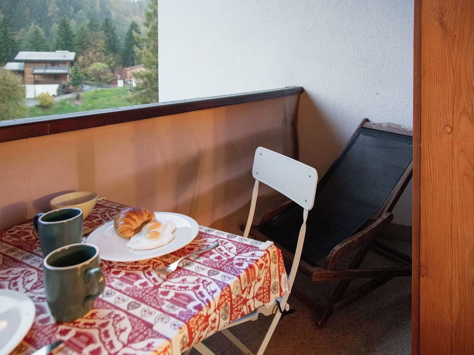 Furniture, Wood Stain, Shade, Chair, Hardwood, Linens, Curtain, Balcony, Daylighting, Armrest