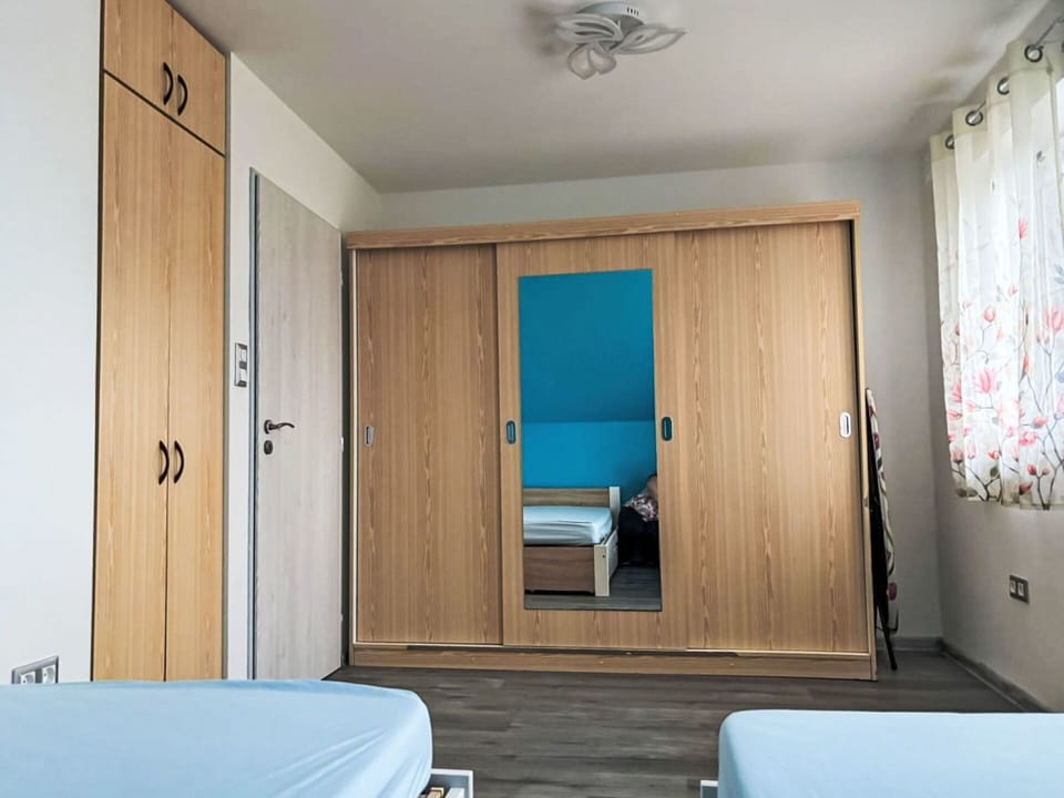 Furniture, Interior Design, Wood, Flooring, Floor, Room, Apartment, Bedroom, Ceiling, Cabinetry
