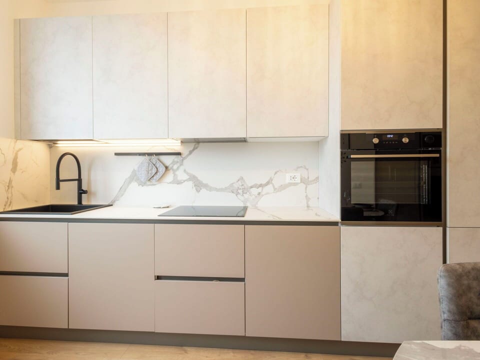 Kitchen, Flooring, Wood, Countertop, Interior Design, Floor, Cabinetry, Kitchen Appliance, Furniture, Brown