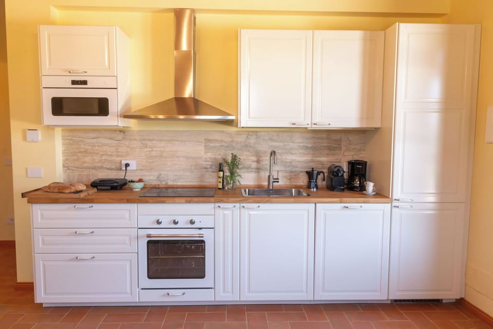 Kitchen, Cabinetry, Countertop, Kitchen Appliance, Flooring, Wood, Interior Design, Major Appliance, Furniture, Floor