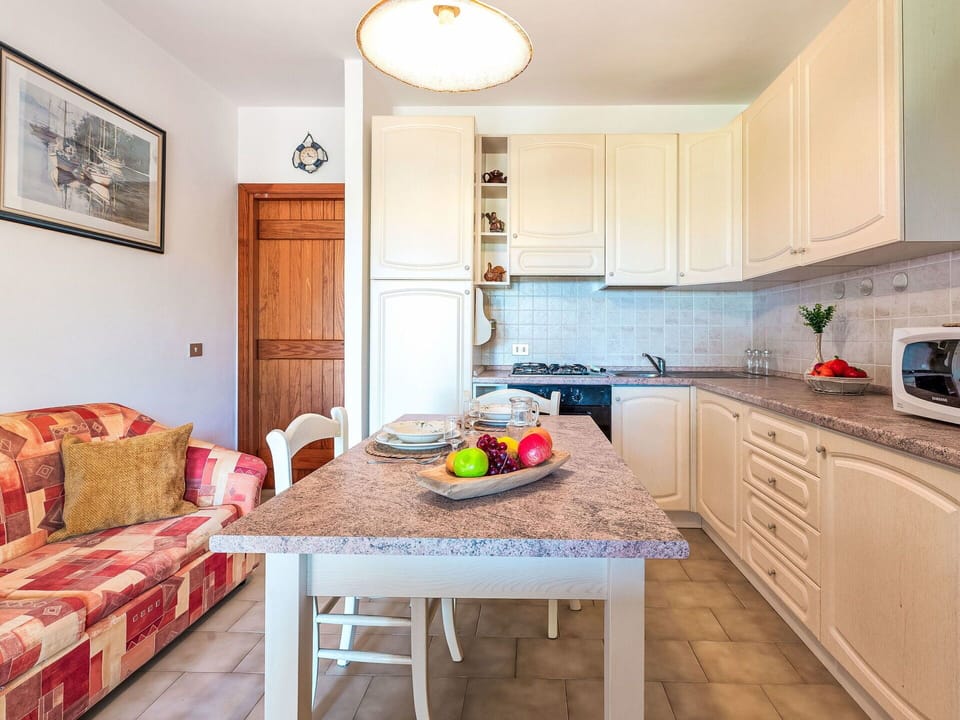 Furniture, Interior Design, Flooring, Floor, Wood, Table, Room, Ceiling, Lighting, Apartment