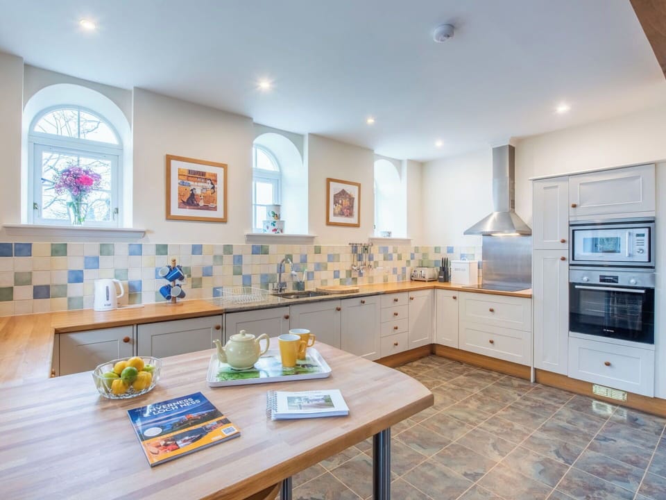 Flooring, Interior Design, Kitchen, Floor, Countertop, Ceiling, Cabinetry, Kitchen Appliance, Furniture, Major Appliance