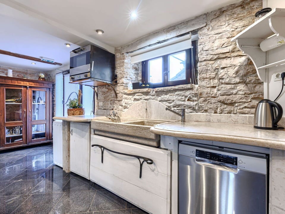 Kitchen, Countertop, Flooring, Interior Design, Furniture, Cabinetry, Kitchen Appliance, Lighting, Sink, Floor