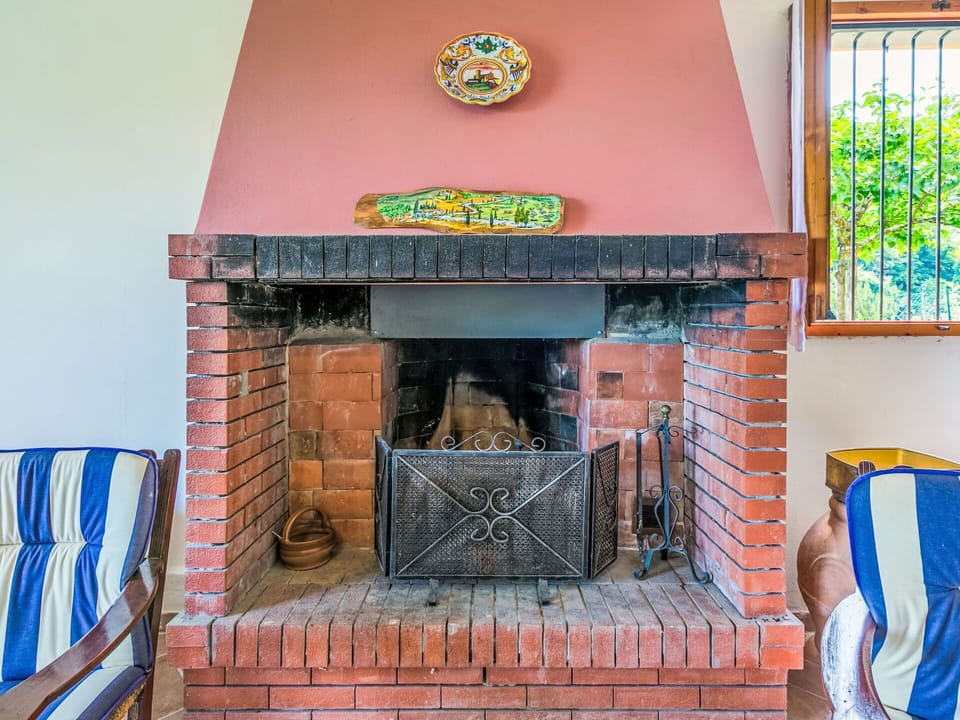 Hearth, Wood, Furniture, Brick, Wood Stain, Fireplace, Living Room, Chair, Hardwood, Chimney