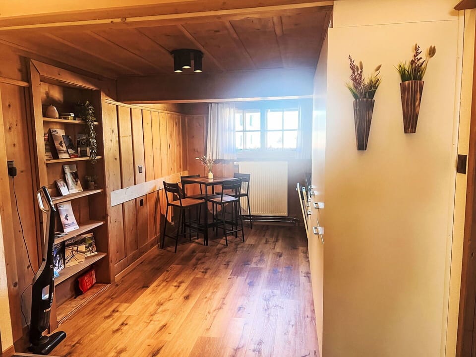 Furniture, Interior Design, Flooring, Wood, Floor, Ceiling, Room, Wood Flooring, Lighting, Hardwood