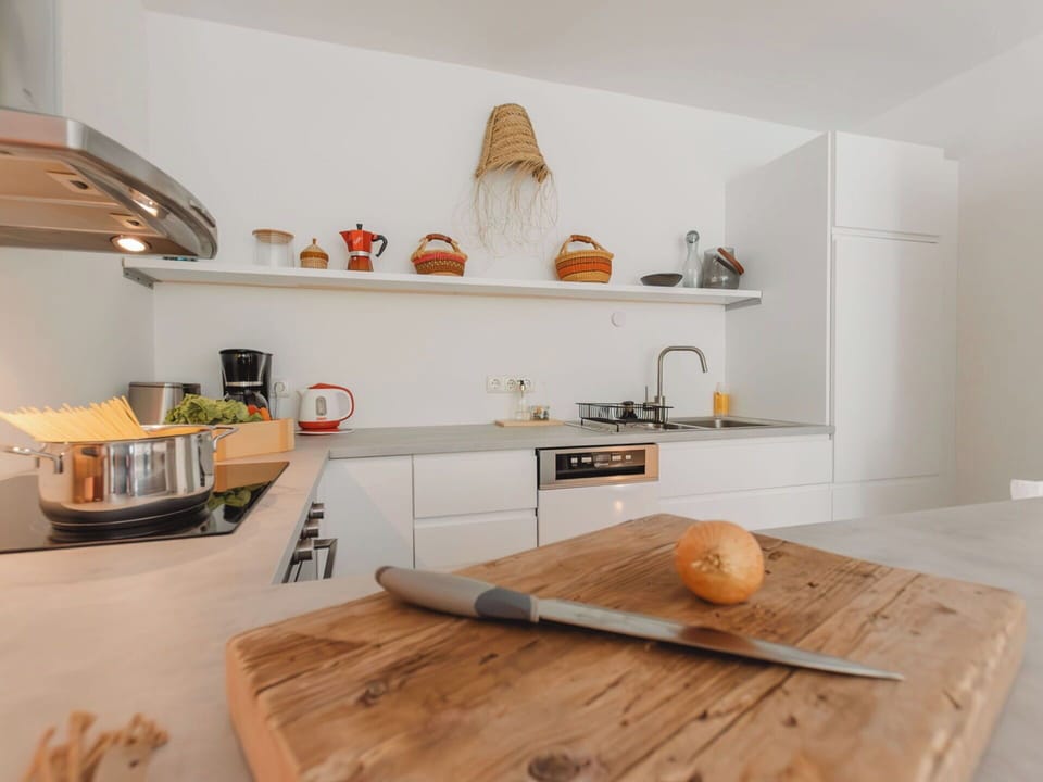 Countertop, Furniture, Kitchen, Interior Design, Wood, Flooring, Kitchen Appliance, Cabinetry, Home, Home Appliance