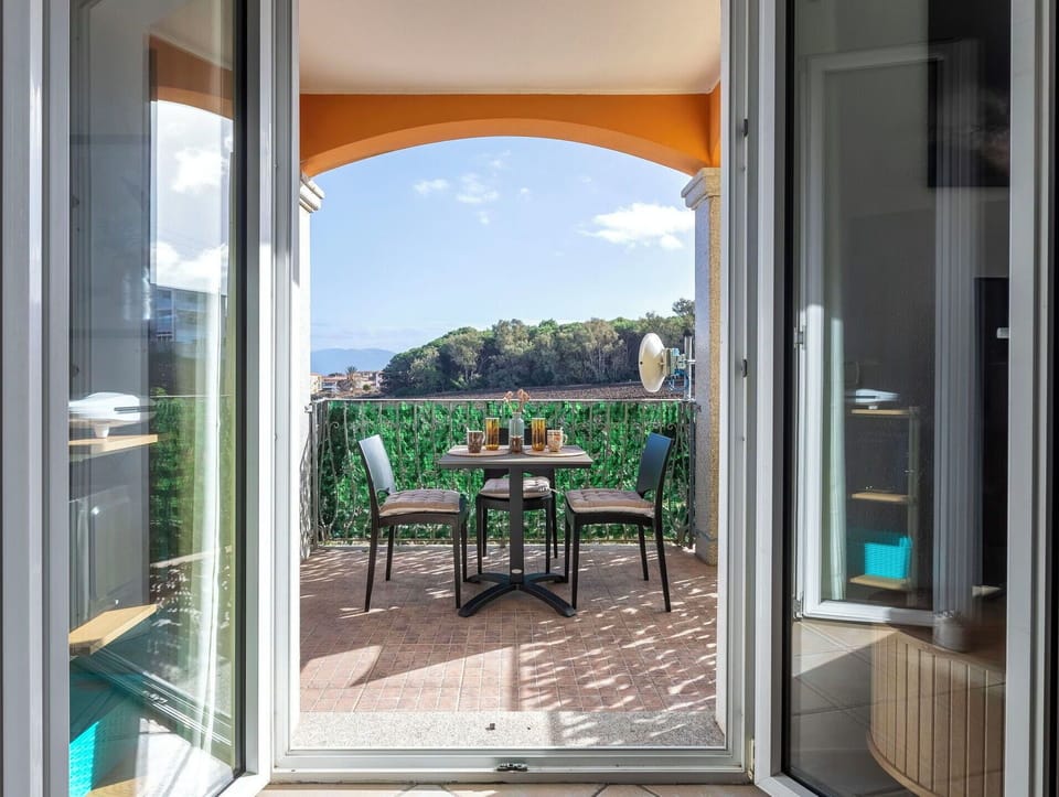 Balcony, Chair, Glass, Eco Hotel, Resort, Shade, Wood Stain, Kitchen & Dining Room Table, Outdoor Furniture, Villa