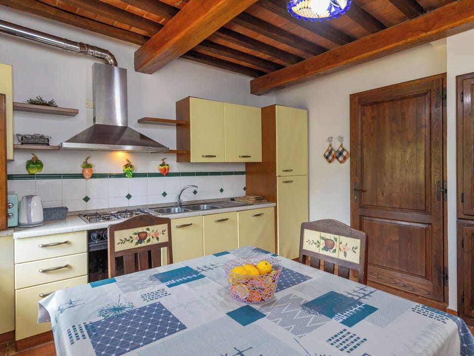 Interior Design, Furniture, Wood, Flooring, Ceiling, Room, Kitchen, Floor, Cabinetry, Lighting