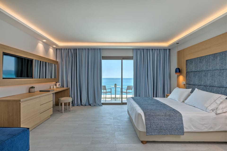 Family Room, Sea View | In-room safe, blackout drapes, free WiFi, bed sheets