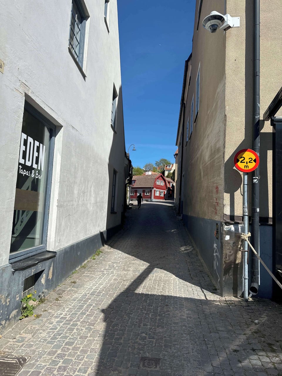 The calm street outside.