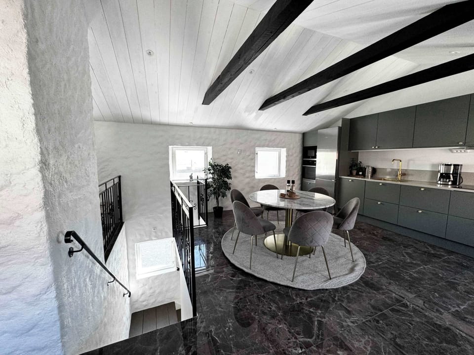 Beautiful kitchen area with nice stone floor.