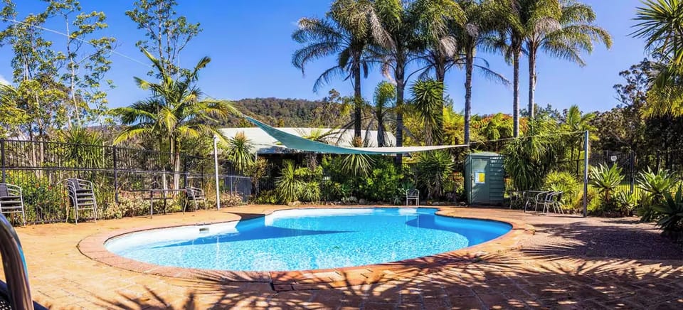 The pool (shared with other cabins) - that you are welcome to use for your stay!