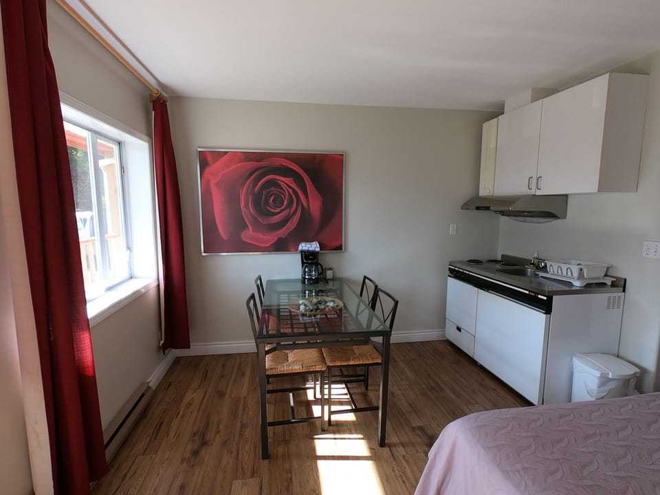Standard Room, 2 Queen Beds, Partial Ocean View | Private kitchen | Full-size fridge, stovetop, coffee/tea maker, cookware/dishes/utensils