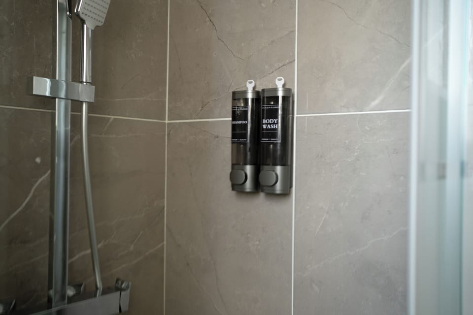 Comfort Double Room, City View | Bathroom | Shower, hair dryer, towels, soap