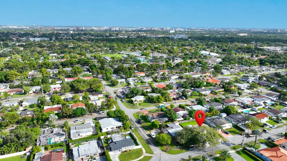 Surrounded by mature trees and well-maintained properties, the neighborhood exudes a calm, leafy atmosphere.