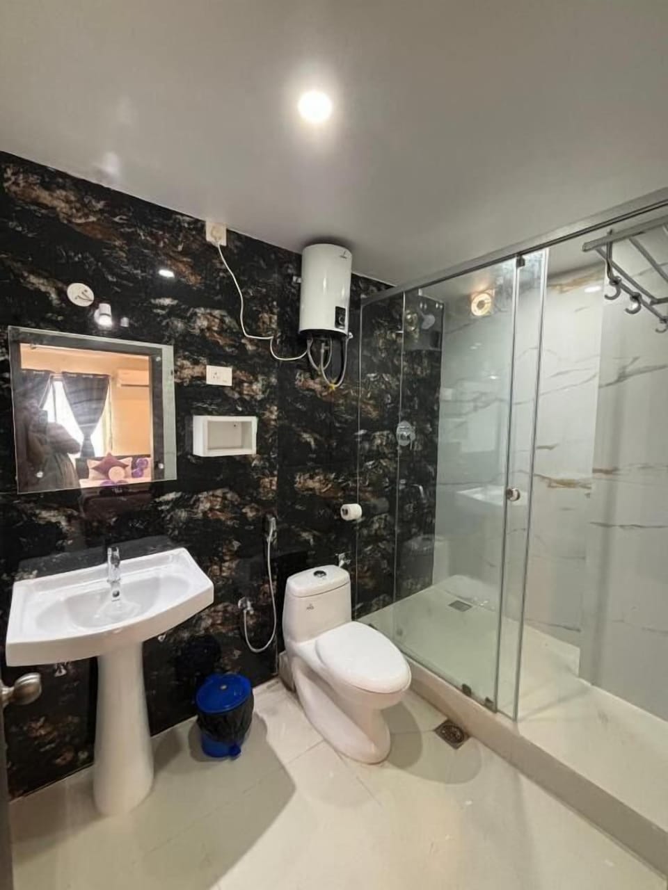 Shower, towels, soap, toilet paper