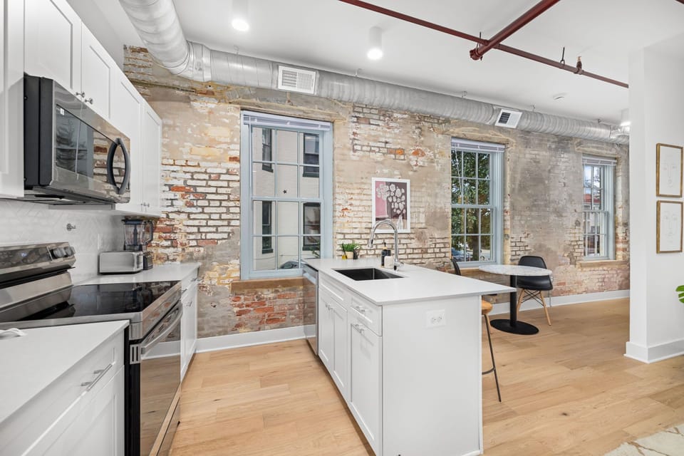Curated living space where 1800s brick meets contemporary style

