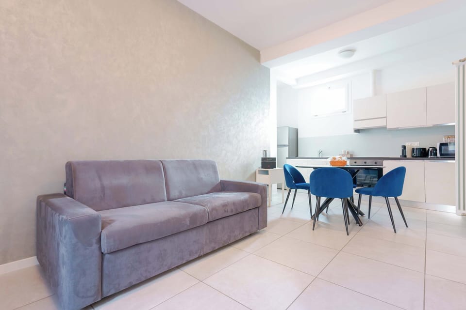 Apartment, 1 Bedroom, Balcony | Living area | Flat-screen TV, fireplace