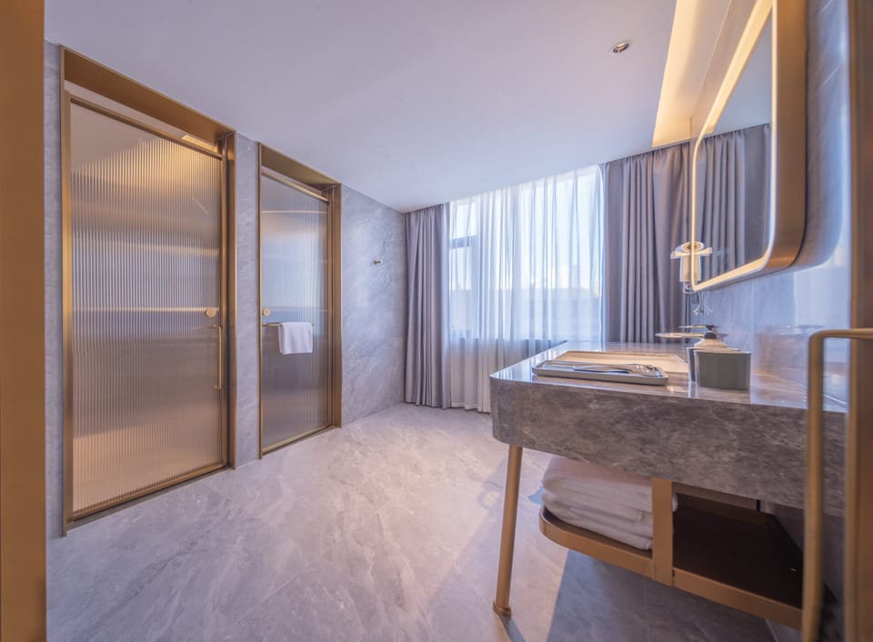 Superior Double Room, Courtyard View | Bathroom | Free toiletries, hair dryer, towels, soap