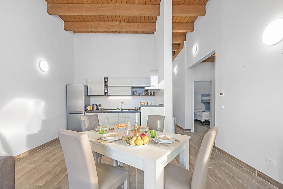 Family Apartment, Multiple Bedrooms, 2 Bathrooms (Tana Delle Volpi) | Dining