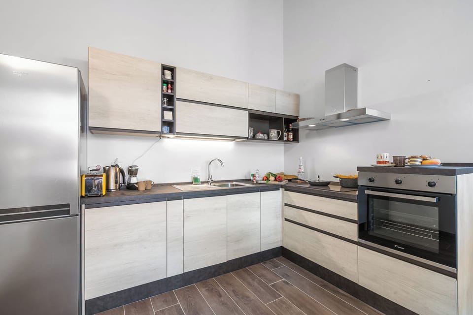 Family Apartment, Multiple Bedrooms, 2 Bathrooms (Tana Delle Volpi) | Private kitchen | Oven, stovetop, dishwasher, coffee/tea maker