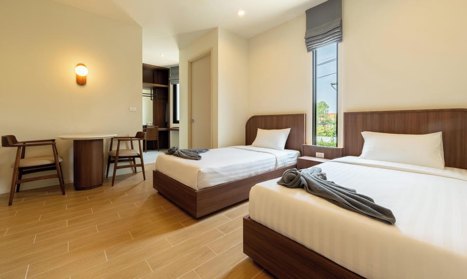 Standard Twin Room Balcony | In-room safe, desk, laptop workspace, blackout drapes