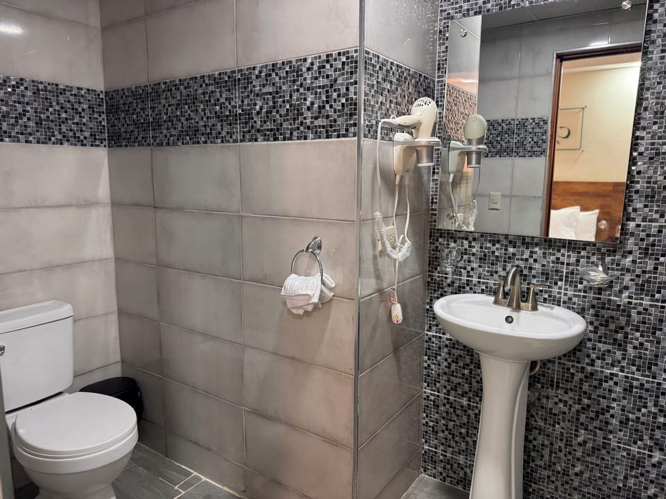 Shower, free toiletries, towels, soap