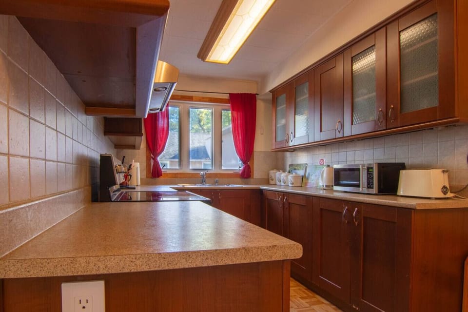 Spacious kitchen – plenty of storage and natural light