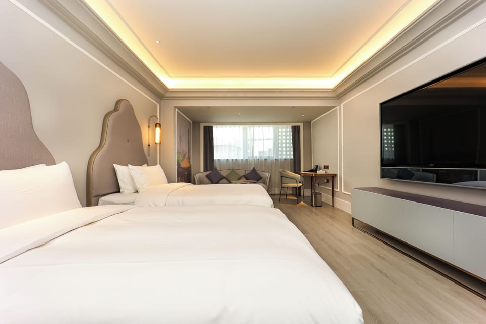Deluxe Room, 2 Twin Beds | Minibar (free items), soundproofing, WiFi (free), bed sheets
