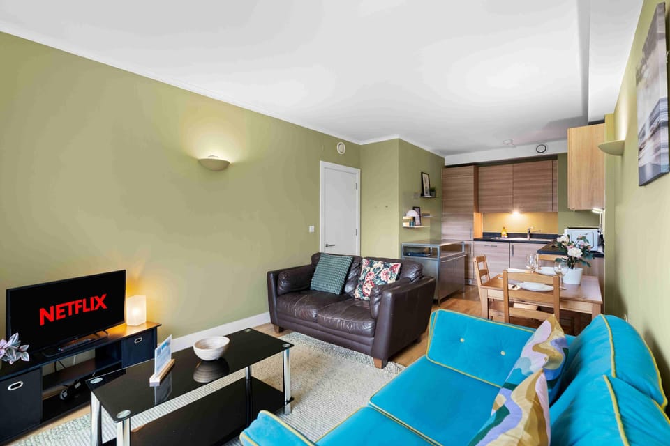 Spacious living area combining a sleek fitted kitchen and lounge space ideal for relaxing and socialising