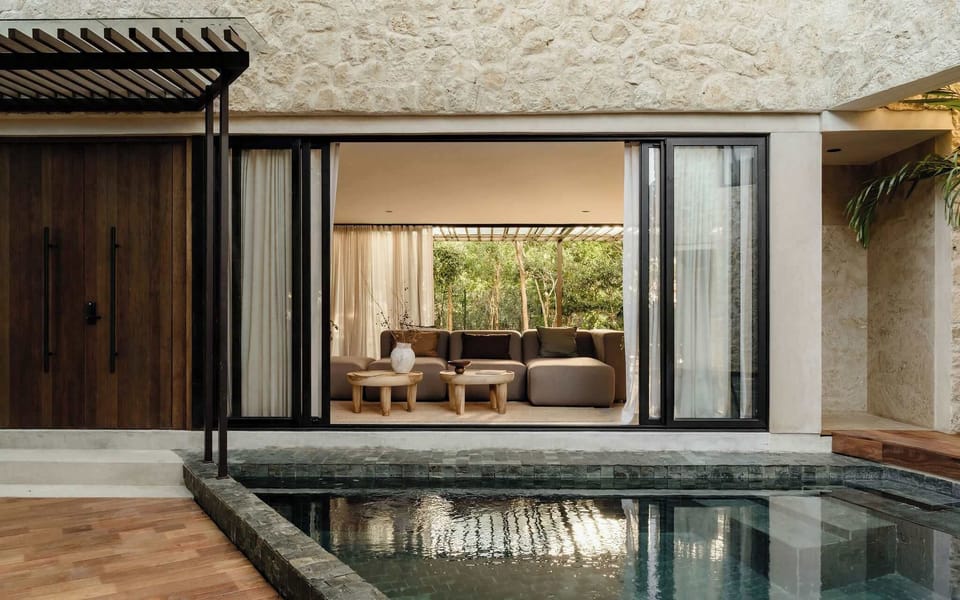 Seamless living space opening directly onto the pool.