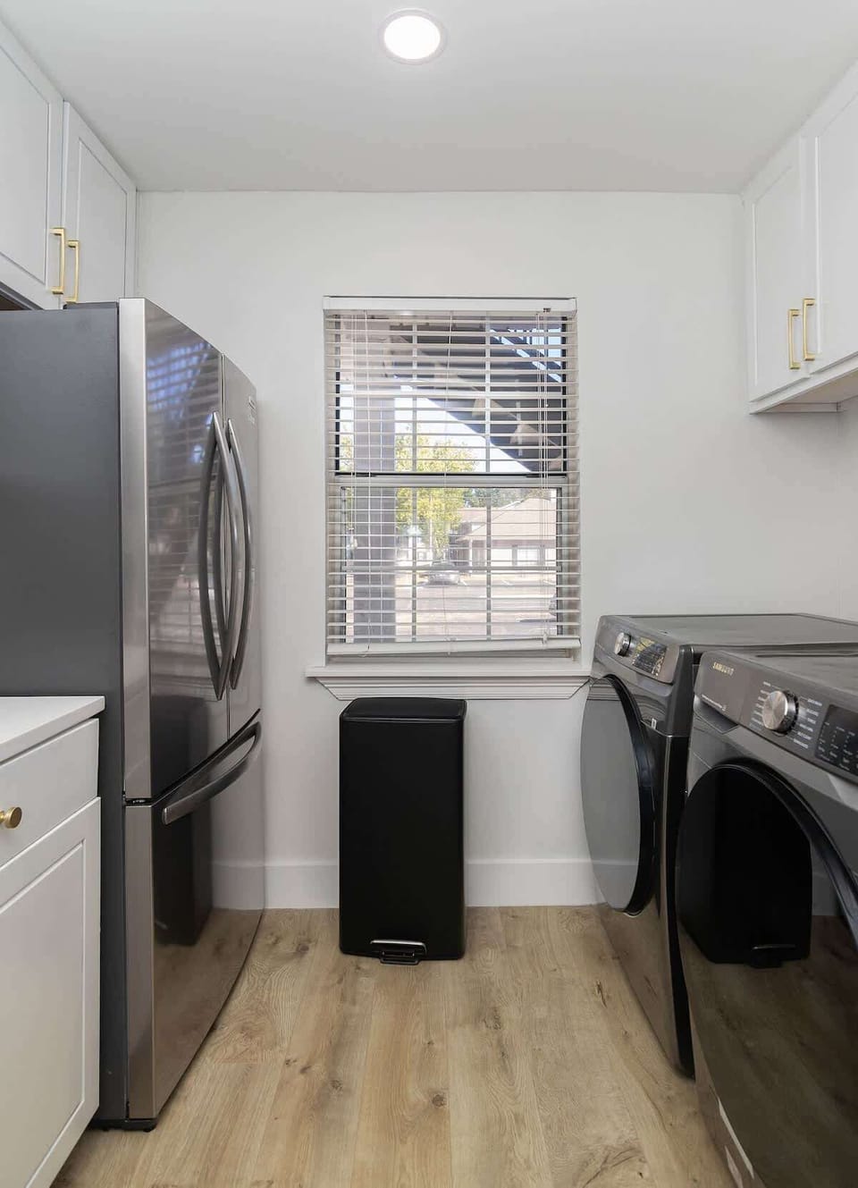 Includes laundry area.