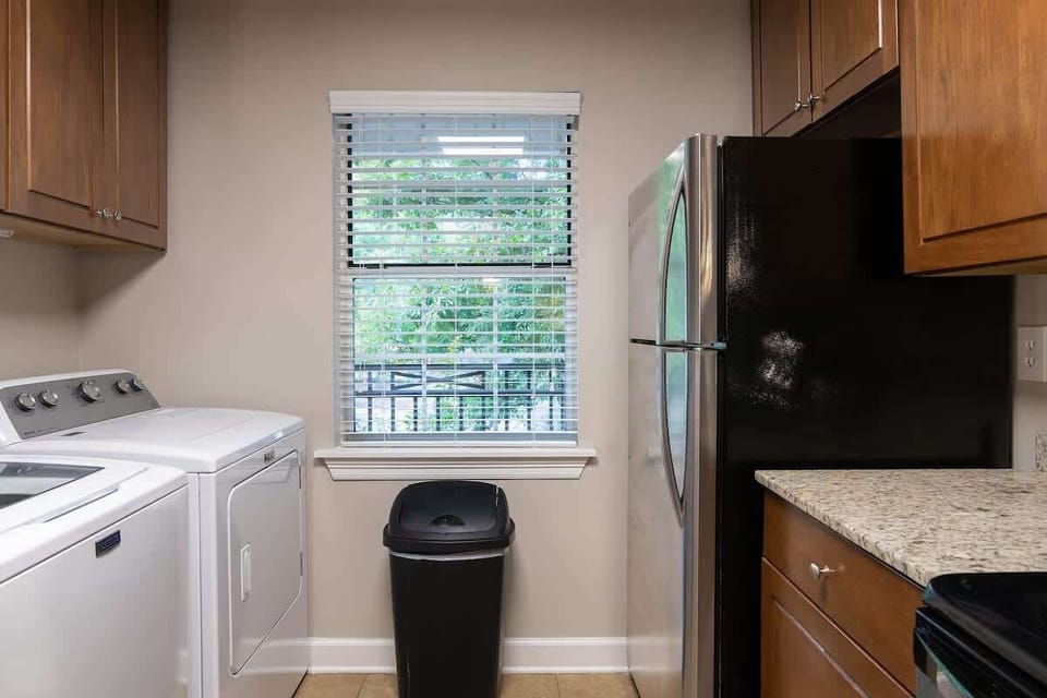 Includes laundry area.