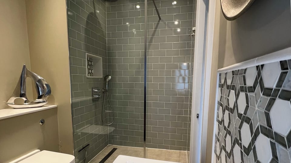 Shower, free toiletries, towels, soap