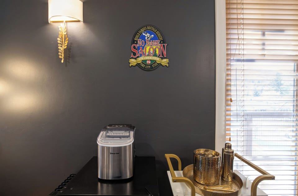 Your modern kitchen features convenient amenities like a bar cart and ice maker.