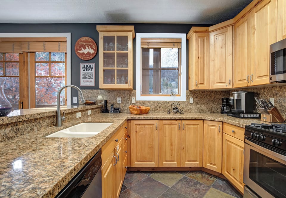Your fully equipped kitchen features granite countertops, quality appliances, and everything you need to prepare meals during your stay.