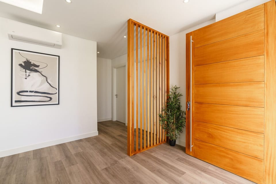Design-led entrance with warm wood details.