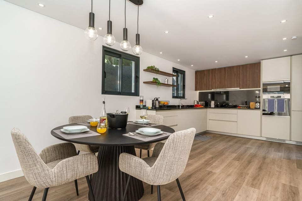 Cook and dine in a sleek open kitchen.