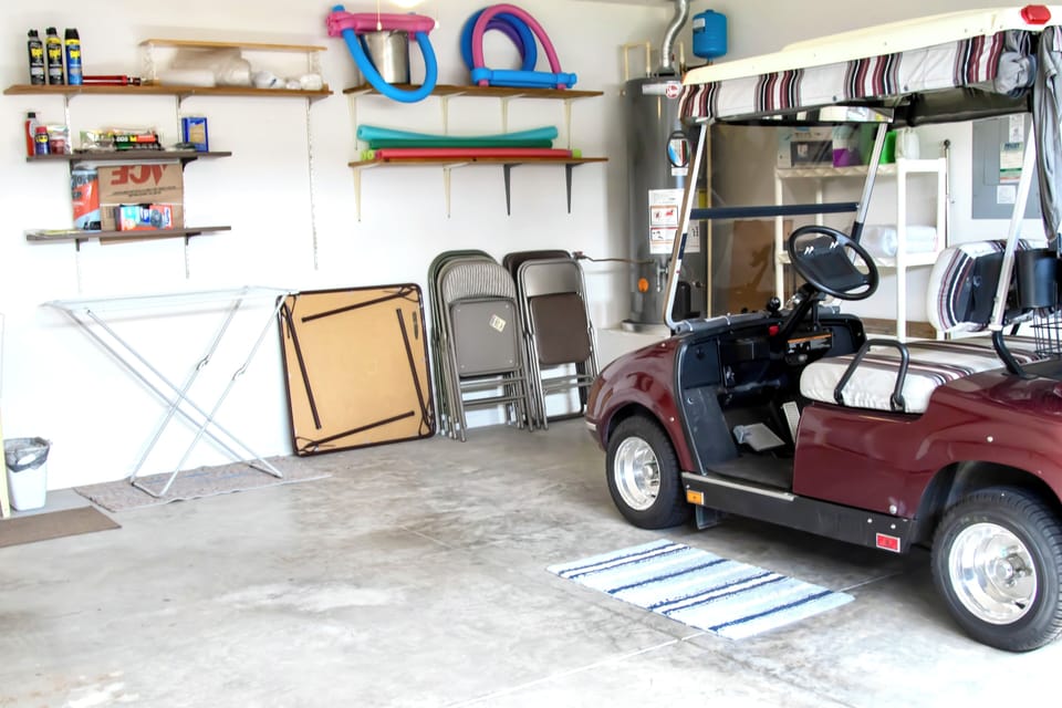 Your private garage features a golf cart for easy property navigation, plus organized storage for all your vacation essentials.