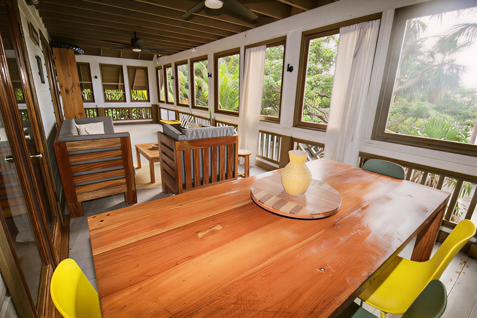 Large screened in porch great for outdoor dining and relaxing