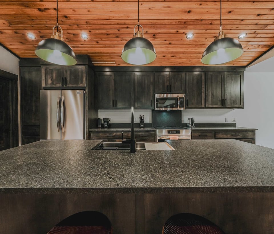 Whip up your favorite dishes in the fully stocked kitchen