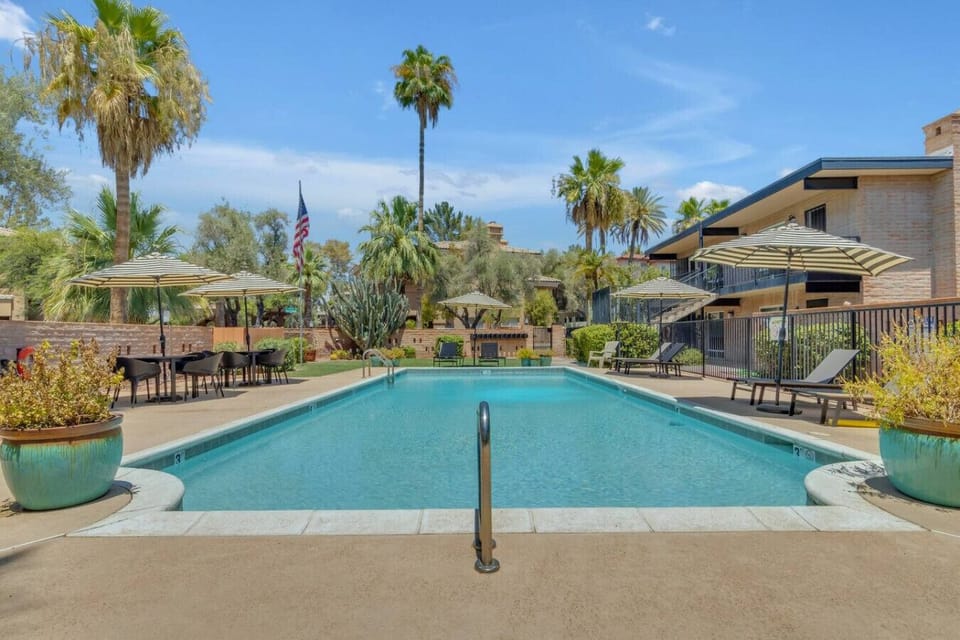 The pool area is lined with palms and stays pretty quiet during the week.