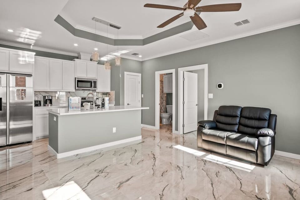 Bright, breezy open-concept living—your comfy home base after a day of adventure.”