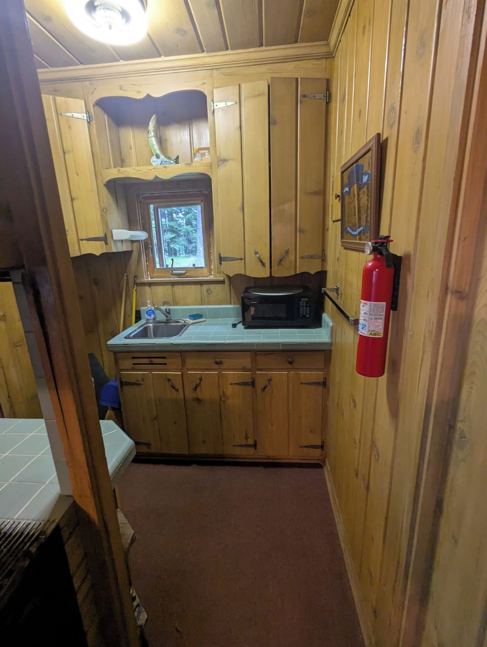 indoor, coffee and or coffee maker, kitchen, microwave, kitchen visible